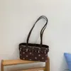 Bolso tipo baguette de lunares con diseño de nicho estilo coreano para mujer, nuevo modelo de verano 2026, bolso de hombro y axila de gran capacidad con hebilla de cinturón