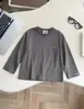 Camiseta de algodón de manga larga con cuello redondo, estilo coreano, con estampado de moda, top casual para niños y niñas, novedad Otoño 2026