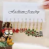 Pendientes de la Serie Navideña Transfronteriza Europea y Americana Creativo Dibujo Animado Papá Noel Reno Set de Regalo para Mujeres Fresco y Dulce
