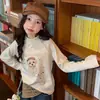 Camiseta base de forro polar para niña, nuevo estilo 2026 para otoño e invierno, camiseta de manga larga con bloques de color cepillada para niños mayores