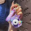 Chaveiro de câmera de projeção Sanrio de desenho animado criativo para carro, pingente requintado para bolsa de casal, ornamentos fofos luminosos