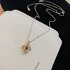Collar floral de perlas con incrustaciones de diamantes estilo vintage francés, sensación de lujo ligero y alta gama, versátil y elegante, adecuado para ir al trabajo, venta al por mayor