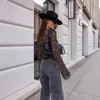 2025 Aliexpress Primavera/Verano Nuevo Top de Moda de Cuello en V con Malla de Estampado de Leopardo y Manga Larga Acampanada para Mujer