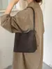 Bolso de mano transfronterizo estilo vintage, nuevo modelo otoño 2026 para mujer, bolso de hombro minimalista de nicho para el día a día con monedero a juego