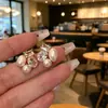 Suministro para puesto de mercado nocturno pendientes de pin de plata 925 perla estilo ins moda pendientes Joker pendientes de temperamento simple al por mayor