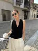 Blusa Roja Retro Wanwei para Mujer 2026 Primavera Nuevo Estilo Cuello en V Profundo Lyocell Ajustada Chaleco de Punto P5301