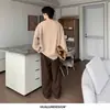 Camiseta texturizada com decote V e mangas compridas, unissex, moderna e estilosa para primavera e outono, modelagem solta, fresca e sofisticada, perfeita como camada interna ou camiseta básica