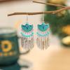 Pendientes de colores semicirculares a juego accesorios para ropa minoritaria pendientes de personalidad de hoja joyería de margarita al por mayor