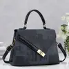 Bolso de mano único e irregular de retazos de colores vibrantes retro y moderno, bolso de mujer con solapa de jacquard de alto valor, bolso de moda