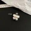 Pinza para el pelo de metal plateado estilo minimalista con lazo y diseño de trébol de cuatro hojas, Accesorio para el pelo de diseño nicho de alta gama para mujer