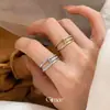 Anillo abierto de doble capa redondo de circonita cúbica de temperamento coreano nicho sensación de alta gama anillo para el dedo índice joyería de mano versátil simple de lujo ligero