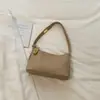 Bolsa de axila estilosa e atraente para mulheres, nova coleção de outono de 2026, bolsa de ombro da moda em cor sólida, simples e prática para o trabalho e o trajeto