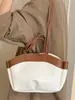 Bolso tote elegante de alta capacidad para mujer, nuevo modelo de verano 2026, bolso de hombro de color liso, bolso de mano moderno y chic
