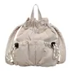 Mochila Casual Leve com Cordão Mochila Pequena Casual para o Dia a Dia Feminina Chegada Nova Outono 2026 Bolsa de Cor Sólida Bolsa Pequena Tipo Balde