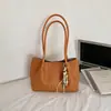 Bolso tote de nicho transfronterizo para mujer, nueva colección otoño 2026, bolso de hombro elegante y sofisticado con diseño tipo cesta