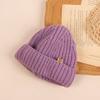 Gorro de punto sencillo para niños estilo ins, elegante gorro de lana con etiqueta de tela de color liso para bebé, gorro de arrendador, gorro de piel de melón.