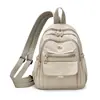 Mochila Pequeña para Mujer Modelo Nuevo 2026, Bolsa Ligera de Nylon, Cremallera Multicapa, Mini Mochila Versátil Casual al por Mayor