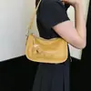 Bolsa de antebraço feminina, nova tendência de moda outono 2026, bolsa de ombro de alta qualidade para o dia a dia, bolsa transversal versátil estilo travesseiro