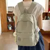 Mochila bordada de nicho da moda para alunos do ensino fundamental II e médio, alto valor estético, design simples, grande capacidade, mochila de viagem feminina