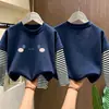 Camiseta de manga larga para niña, nuevo estilo primavera/otoño 2026, base infantil moderna y linda, conjunto de otoño de algodón puro, top tipo dos piezas