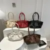 Bolso de mano moderno de gran capacidad 2026 otoño nuevo bolso de hombro plisado bolso de nicho para el trabajo