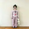 Conjunto casual para meninas, nova coleção primavera/outono 2026, conjunto estiloso e moderno de duas peças listradas, calça pantalona para meninas