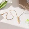 Taina Moda Transfronteriza Europea y Americana Oro de 18 Quilates Diseño de Nicho Colgante de Pez Pequeño Collar Estilo Festivo Joyería de Lujo Ligero Venta al por Mayor