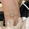 Nueva Pulsera de Luz de Estrella de Cuatro Puntas para Mujer Estilo ins Aspecto de Lujo Accesible Nicho de Alta Gama Simple Versátil Ajustable