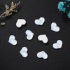 Nuevas joyas de cristal para uñas con forma de corazón de melocotón ancho y moca plana, decoraciones para uñas usables de colores mágicos.