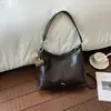 Bolso de mano de moda transfronterizo para mujer, nuevo estilo otoño 2026, casual, alto valor estético, vintage, elegante, versátil bolso de hombro y cruzado
