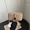 Bolsa Pequena com Textura Retrô Bolsa Feminina 2026 Nova Bolsa Quadrada Pequena de Camurça e Pelúcia Simples Versátil Bolsa de Celular Transversal