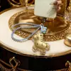 Llavero Pulsera Oro Puro 999 Riqueza Instantánea Encanto Bolsa Caballo Dorado Colgante Teléfono Souvenir