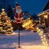 Lámpara de Proyección Hueca de Arte en Hierro Alimentada por Energía Solar Impermeable para Exteriores Lámpara de Tetera de Papá Noel Luz de Decoración de Césped para Jardín