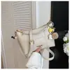 Bolso de Hombro Casual Versátil Estilo Coreano de Nicho Nuevo Verano 2026 para Viajes Diarios y Compras, Bolso Cruzado de Alta Calidad Transfronterizo