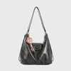 Bolsa Tote de Ombro Feminina Grande Capacidade Estilo Coreano 2026 Outono/Inverno PU Novo Estilo Design para o Trabalho Textura Pingente