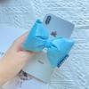 Ins Lazo de Cuero Soporte Airbag para Teléfono Móvil Estéreo Macaron Color Sólido Lazo de Peluche Soporte de Escritorio Venta al por Mayor