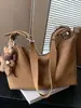 Bolso versátil transfronterizo para mujer 2026 nuevo estilo moda bolso para ir al trabajo bolso de axila texturizado para mujer bolsa bandolera de gran capacidad para mujer