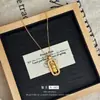Colar de ouro com diamantes incrustados, pingente de guerreiro rotativo, pilão de diamante, corrente de clavícula feminina de alto padrão novo chinês, atacado