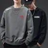 Envio RápidoNova Blusa de Moletom Solta com Gola Redonda e Manga Longa para Primavera e Outono, Camisa Básica Estampada da Moda Masculina