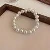 Pulseira de pérola elástica simples retrô francesa Pulseira de moda de luxo leve francesa Pulseira de temperamento versátil para o dia a dia atacado