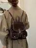 Mochila retro de gran capacidad con múltiples bolsillos para comercio exterior, bolso de hombro casual de nicho para el día a día, elegante bolsa de mano de viaje