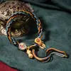 Las Pulseras Tejidas de Xizang Se Pueden Colgar con Thangka, Hilo Rojo Zaki Ram, Pulsera Amarilla del Dios de la Riqueza, Regalos para Hombres y Mujeres, Estilo Étnico al por Mayor