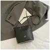 2025 Nuevo Bolso de Cubo Tejido Simple Bolso de Hombro de Moda Ins Coreana Bolso Nicho para Mujer para Desplazamiento Axilar