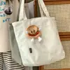Bolsa Tote Casual Simples Estilo Japonês Estilo Ins para Mulheres 2024 Nova Grande Capacidade Bolsa de Ombro Cor Pura para Estudantes