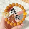 Pulsera de Queso con Cabeza de Mono Tallada con Corazón de Marfil Nogal Pequeño Círculo Único Pulsera de Cuentas Budistas para Hombres para Mujeres