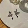 Pendientes de mariposa de lujo, sencillos y ligeros, con diseño de nicho para mujer, de alta gama, 2023, nuevos y modernos, con diseño de viento frío.