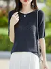 Camisa de algodão 100% com gola redonda, mangas curtas vazadas, textura oca tridimensional, design de nicho para primavera e verão, versátil e confortável, atacado