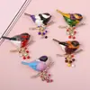Nuevo broche de pájaro al óleo de aleación de viento simple, broche de ramillete de animal con personalidad de moda, accesorios de ropa al por mayor