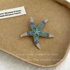 Nuevo broche de vida marina con pedrería Moda europea y americana broche de concha de ballena vintage elegante accesorios para cuello de bolso