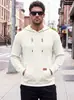 Sudadera con capucha de punto para hombre transfronteriza TK primavera y otoño jacquard texturizado manga larga bolsillo canguro etiqueta de cuero cordón sudadera casual